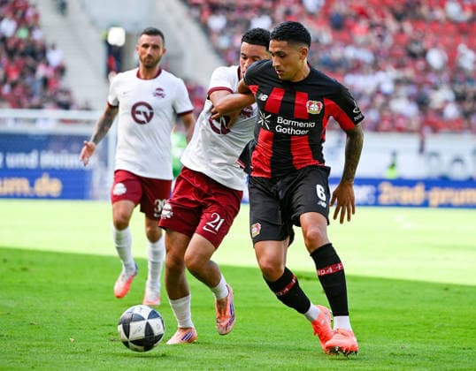 25.07.2026, xpsx, Fussball Testspiel, Kickers Offenbach - Bayer 04 Leverkusen v.l. Mohamadaziz Abdelhadi (Offenbacher Kickers), Equi Fernandez (Bayer 04 Leverkusen) (DFL DFB REGULATIONS PROHIBIT ANY USE OF PHOTOGRAPHS as IMAGE SEQUENCES and or QUASI-VIDEO) emspor Offenbach *** July 25, 2026, xpsx, Soccer Friendly Match, Kickers Offenbach vs. Bayer 04 Leverkusen, featuring Mohamadaziz Abdelhadi of Kickers Offenbach, Equi Fernandez, Bayer 04 Leverkusen; DFL and DFB regulations prohibit any use of photographs as image sequences and or quasi-video content on emspor Offenbach