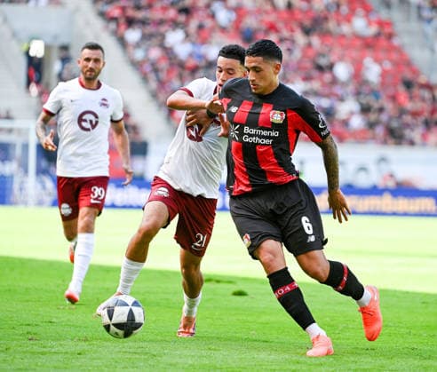 25.07.2026, xpsx, Fussball Testspiel, Kickers Offenbach - Bayer 04 Leverkusen v.l. Mohamadaziz Abdelhadi (Offenbacher Kickers), Equi Fernandez (Bayer 04 Leverkusen) (DFL DFB REGULATIONS PROHIBIT ANY USE OF PHOTOGRAPHS as IMAGE SEQUENCES and or QUASI-VIDEO) emspor Offenbach *** July 25, 2026, xpsx, Soccer Friendly Match, Kickers Offenbach vs. Bayer 04 Leverkusen, featuring Mohamadaziz Abdelhadi of Kickers Offenbach, Equi Fernandez, Bayer 04 Leverkusen; DFL and DFB regulations prohibit any use of photographs as image sequences and or quasi-video content on emspor Offenbach
