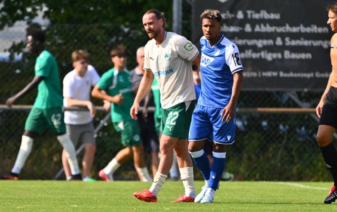 25.07.2026 - Fussball - Saison 2026 2027 - Testspiel Freundschaftsspiel Vorbereitungsspiel - TSG 1899 Hoffenheim - SpVgg Greuther Fürth ( Kleeblatt ) - - Sportfoto Zink - xwoxzix - regulations prohibit any use of photographs as image sequences and or quasi-video - only for editorial use - Jannis Heuer (22, SpVgg Greuther Fürth ) muss angeschlagen aufgeben - Bambase Conte (20, TSG 1899 Hoffenheim ) bei ihm *** July 25, 2026 Soccer Season 2026–2027 Exhibition Match Friendly Match Preseason Match TSG 1899 Hoffenheim SpVgg Greuther Fürth Kleeblatt Sports Photo Zink xwoxzix Regulations prohibit any use of photographs as image sequences and or quasi-video For editorial use only. Jannis Heuer, 22, SpVgg Greuther Fürth, is forced to give up the ball to Bambase Conte, 20, of TSG 1899 Hoffenheim