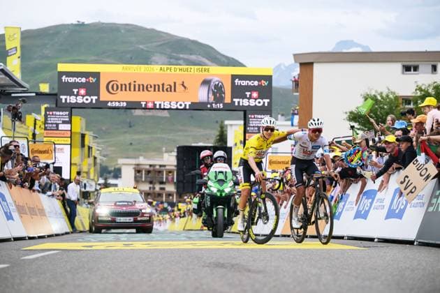 Slovenian Tadej Pogacar of UAE Team Emirates-XRG and Mexican Isaac Del Toro of UAE Team Emirates XRG celebrate as they cross the finish line at stage 20 of the 2026 Tour de France cycling race, a stage of 171km Le Bourg d Oisans to Alpe d Huez, on Saturday 25 July 2026. The 113th edition of the Tour de France starts on Saturday 4 July in Barcelona, Spain, and will finish in Paris, France on the 26th of July. DAVIDxPINTENS  x182016475x