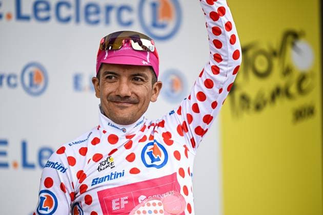 Ecuadorian Richard Carapaz of EF Education-EasyPost celebrates on the podium in the red polka-dot jersey for best climber after stage 20 of the 2026 Tour de France cycling race, a stage of 171km Le Bourg d Oisans to Alpe d Huez, on Saturday 25 July 2026. The 113th edition of the Tour de France starts on Saturday 4 July in Barcelona, Spain, and will finish in Paris, France on the 26th of July. DAVIDxPINTENS  x182017062x