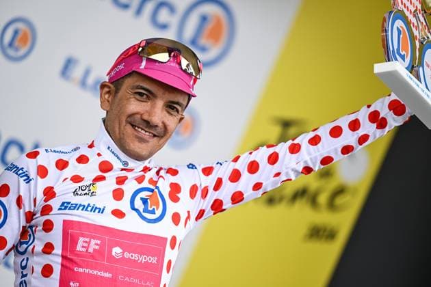 Ecuadorian Richard Carapaz of EF Education-EasyPost celebrates on the podium in the red polka-dot jersey for best climber after stage 20 of the 2026 Tour de France cycling race, a stage of 171km Le Bourg d Oisans to Alpe d Huez, on Saturday 25 July 2026. The 113th edition of the Tour de France starts on Saturday 4 July in Barcelona, Spain, and will finish in Paris, France on the 26th of July. DAVIDxPINTENS  x182017827x