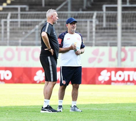 Fussball-Bundesliga - Saison 2026 27 Bruchweg-Stadion - Testspiel 25.07.26 1. FSV Mainz 05 (mz) - Holstein Kiel (ki) 3:0 Trainergespräch: Tim WALTER (ki),li - Trainer Urs FISCHER (1. FSV Mainz 05) Fussball-Bundesliga - 1. FSV Mainz 05 *** German Bundesliga 2026–27 Season, Bruchweg Stadium, Friendly Match, July 25, 2026, FSV Mainz 05 vs. Holstein Kiel, 3–0. Coach Interview with Tim WALTER,li Coach Urs FISCHER 1 FSV Mainz 05 German Bundesliga 1 FSV Mainz 05