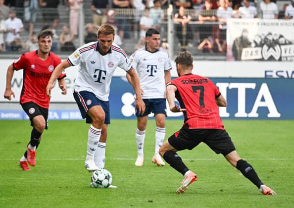 25.07.2026, xsltx, Fussball Testspiel, SV Wehen Wiesbaden - FC Bayern München v.l. Joao Palhinha (FC Bayern München), Lukas Schleimer (SV Wehen Wiesbaden) (DFL DFB REGULATIONS PROHIBIT ANY USE OF PHOTOGRAPHS as IMAGE SEQUENCES and or QUASI-VIDEO) *** July 25, 2026, xsltx, Soccer Friendly Match, SV Wehen Wiesbaden vs. FC Bayern Munich, Joao Palhinha, FC Bayern Munich, Lukas Schleimer, SV Wehen Wiesbaden. DFL and DFB regulations prohibit any use of photographs as image sequences and or quasi-video.