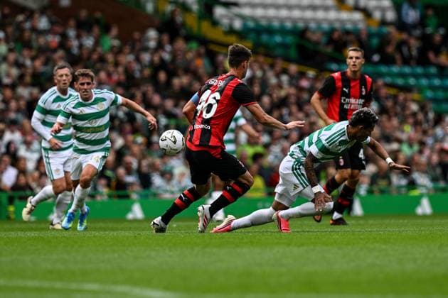 Camilo Duran of Celtic is tackled by Matteo Gabbia of AC Milan during the pre season friendly match between Celtic and AC Milan at Celtic Park, Glasgow, Scotland on Saturday 25th July 2026. Celtic v AC Milan, Pre Season Friendly, Football, Celtic Park, Glasgow, Scotland, UK - 25 Jul 2026Glasgow Celtic Park United Kingdom  Copyright: xAndyxBuchanan Shutterstockx 17004340bk