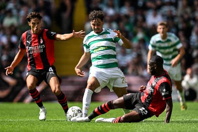 Sebastian Tounekti of Celtic is tackled by Fikayo Tomori of AC Milan during the pre season friendly match between Celtic and AC Milan at Celtic Park, Glasgow, Scotland on Saturday 25th July 2026. Celtic v AC Milan, Pre Season Friendly, Football, Celtic Park, Glasgow, Scotland, UK - 25 Jul 2026Glasgow Celtic Park United Kingdom  Copyright: xAndyxBuchanan Shutterstockx 17004340bt