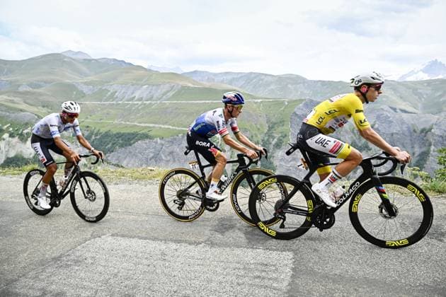 Mexican Isaac Del Toro of UAE Team Emirates XRG, Belgian Remco Evenepoel of Red Bull-BORA-hansgrohe and Slovenian Tadej Pogacar of UAE Team Emirates XRG pictured in action during stage 20 of the 2026 Tour de France cycling race, a stage of 171km Le Bourg d Oisans to Alpe d Huez, on Saturday 25 July 2026. The 113th edition of the Tour de France starts on Saturday 4 July in Barcelona, Spain, and will finish in Paris, France on the 26th of July. JASPERxJACOBS  x182026202x