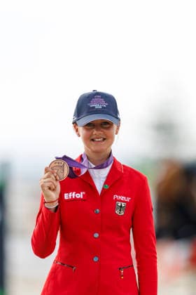 HAGEN a.T.W. - FEI Jumping European Championship, EM, Europameisterschaft Children, Juniors and Young Rider 2026, HAGEN a.T.W. - FEI Jumping European Championship Children, Juniors and Young Rider 2026 OSING Mila (GER) Championship ceremony Final Individual Einzelfinale CH-EU-Ch-S - Children Final Individuals over two rounds - SECOND ROUND Hagen a.T.W., Reitanlage Haunhorst 25. July 2026 - *** HAGEN a T W FEI Jumping European Championship for Children, Juniors, and Young Riders 2026, HAGEN a T W FEI Jumping European Championship for Children, Juniors, and Young Riders 2026 OSING Mila GER Championship Ceremony Final Individual Children’s Final over two rounds SECOND ROUND Hagen a T W, Haunhorst Equestrian Center, July 25, 2026