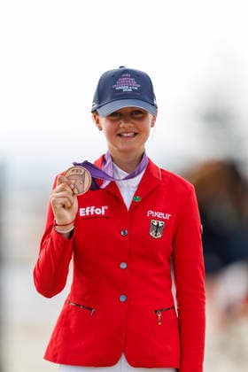 HAGEN a.T.W. - FEI Jumping European Championship, EM, Europameisterschaft Children, Juniors and Young Rider 2026, HAGEN a.T.W. - FEI Jumping European Championship Children, Juniors and Young Rider 2026 OSING Mila (GER) Championship ceremony Final Individual Einzelfinale CH-EU-Ch-S - Children Final Individuals over two rounds - SECOND ROUND Hagen a.T.W., Reitanlage Haunhorst 25. July 2026 - *** HAGEN a T W FEI Jumping European Championship for Children, Juniors, and Young Riders 2026, HAGEN a T W FEI Jumping European Championship for Children, Juniors, and Young Riders 2026 OSING Mila GER Championship Ceremony Final Individual Children’s Final over two rounds SECOND ROUND Hagen a T W, Haunhorst Equestrian Center, July 25, 2026