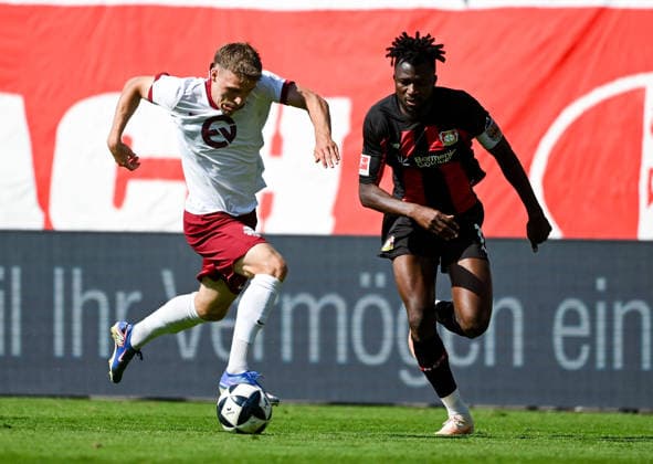 25.07.2026, xpsx, Fussball Testspiel, Kickers Offenbach - Bayer 04 Leverkusen v.l. Maximilian Schmid (Offenbacher Kickers), Edmond Tapsoba (Bayer 04 Leverkusen) (DFL DFB REGULATIONS PROHIBIT ANY USE OF PHOTOGRAPHS as IMAGE SEQUENCES and or QUASI-VIDEO) emspor Offenbach *** July 25, 2026, xpsx, Soccer Friendly Match, Kickers Offenbach vs. Bayer 04 Leverkusen, Maximilian Schmid, Offenbacher Kickers, Edmond Tapsoba, Bayer 04 Leverkusen. DFL and DFB regulations prohibit any use of photographs as image sequences and or quasi-video. emspor Offenbach