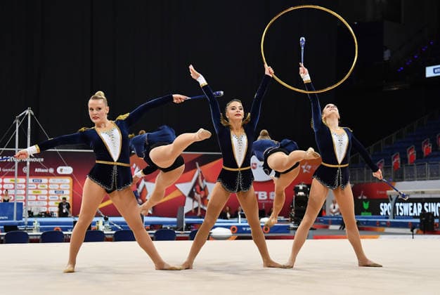 25.07.2026, xhbx, Turnen Rhythmische Sportgymnastik, Deutsche Meisterschaften 2026 v.l. Gruppe, Mannschaft TV Dahn 1910 Reifen Keulen Übung (DFL DFB REGULATIONS PROHIBIT ANY USE OF PHOTOGRAPHS as IMAGE SEQUENCES and or QUASI-VIDEO) Hannover *** July 25, 2026, xhbx, Gymnastics, Rhythmic Gymnastics, 2026 German Championships, Group V, TV Dahn 1910 Team, Hoop, Clubs, Routine. DFL and DFB regulations prohibit any use of photographs as image sequences and or quasi-video. Hanover