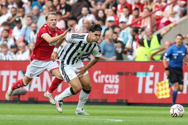 Standard s Alexis Trouillet and Juventus Vasilije Adzic fight for the ball during a friendly soccer game between Belgian first division soccer team Standard de Liege and Italian Juventus, on Saturday 25 July 2026 in Liege, in preparation of the upcoming 2026-2027 Belgian first division soccer season. BRUNOxFAHY  x182034692x