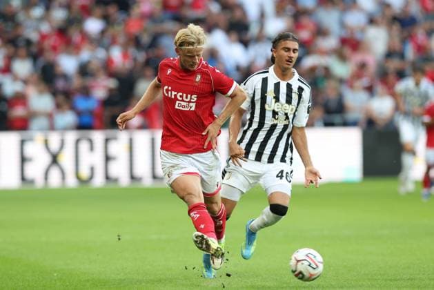 Standard s Gustav Mortensen and Juventus Adin Licina fight for the ball during a friendly soccer game between Belgian first division soccer team Standard de Liege and Italian Juventus, on Saturday 25 July 2026 in Liege, in preparation of the upcoming 2026-2027 Belgian first division soccer season. BRUNOxFAHY  x182035719x