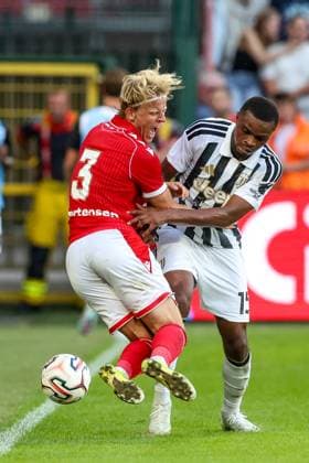 Standard s Gustav Mortensen and Juventus Pierre Kalulu fight for the ball during a friendly soccer game between Belgian first division soccer team Standard de Liege and Italian Juventus, on Saturday 25 July 2026 in Liege, in preparation of the upcoming 2026-2027 Belgian first division soccer season. BRUNOxFAHY  x182036042x