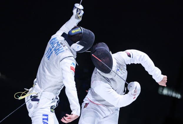 CHINA, HONG KONG - JULY 25, 2026: Italy s Filippo Macchi (L) and the Czech Republic s Alexander Choupenitch compete in the men’s individual foil event at the 2026 Kerry Fencing World Championships. Mikhail Sinitsyn TASS  95441533