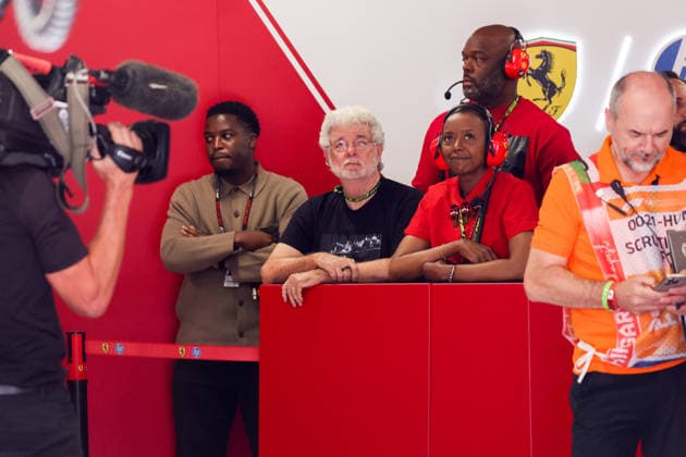July 25, 2026, Budapest, Hungary: Film director George Lucas and his wife Mellody Louise Hobson Lucas are seen in a garage of Lewis Hamilton of Ferrari prior to the qualifying session ahead Formula 1 Hungarian Grand Prix at the Hungaroring circuit in Mogyorod near Budapest on July 25th, 2026. F1 2026: Hungarian Grand Prix  - ZUMAz156 0862646930st Copyright: xBeataxZawrzelx