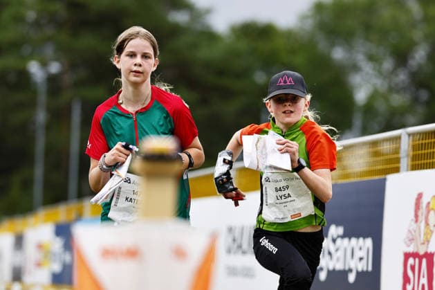 260725 Spurtande löpare efter malgang under den sista etappen av O-Ringen den 25 juli 2026 i Göteborg. *** 260725 Runners sprinting after a wrong turn during the final stage of O Ringen on July 25, 2026, in Gothenburg  Copyright: PETERxHOLGERSSON BB260725PH091
