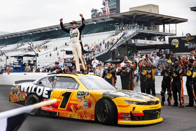 July 25, 2026, Speedway, Indianapolis, USA: CARSON KVAPIL, driver of the No. 1 Chevrolet for JR Motorsports, celebrates on top of his car on the frontstretch after winning the Pennzoil 250 race at the Indianapolis Motor Speedway. Speedway USA - ZUMAw173 20260725_zsp_w173_002 Copyright: xLukexWelshx