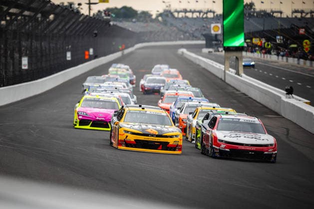 July 25, 2026, Speedway, Indianapolis, USA: SHELDON CREED, driver of the No. 00 Chevrolet for Haas Factory Team, leads the O Reilly Auto Parts Series field into Turn 1 during the start of the Pennzoil 250 race at the Indianapolis Motor Speedway. Speedway USA - ZUMAw173 20260725_zsp_w173_030 Copyright: xLukexWelshx