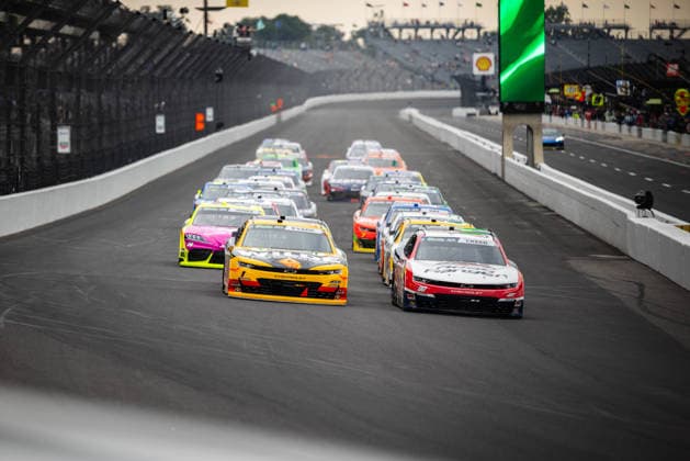 July 25, 2026, Speedway, Indianapolis, USA: SHELDON CREED, driver of the No. 00 Chevrolet for Haas Factory Team, leads the O Reilly Auto Parts Series field into Turn 1 during the start of the Pennzoil 250 race at the Indianapolis Motor Speedway. Speedway USA - ZUMAw173 20260725_zsp_w173_032 Copyright: xLukexWelshx