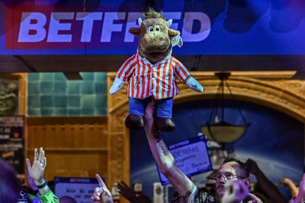 RECORD DATE NOT STATED 25th July 2026, Winter Gardens, Blackpool, Lancashire, England; 2026 Betfred World Matchplay Darts, Day Eight; A toy Bully is held aloft by a fan GodfreyxPitt