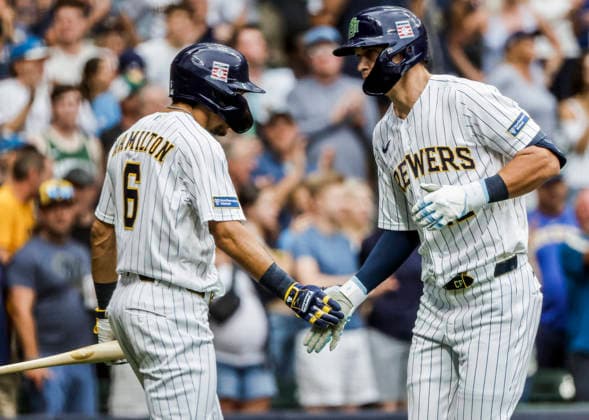 Milwaukee Brewers shortstop Cooper Pratt (R) celebrates with Milwaukee Brewers third baseman David Hamilton after hitting a home run in the second inning of the MLB, Baseball Herren, USA game between the Colorado Rockies and the Milwaukee Brewers at American Family Field in Milwaukee, Wisconsin on Saturday July 25, 2026.  MIL20260725806 TANNENxMAURY