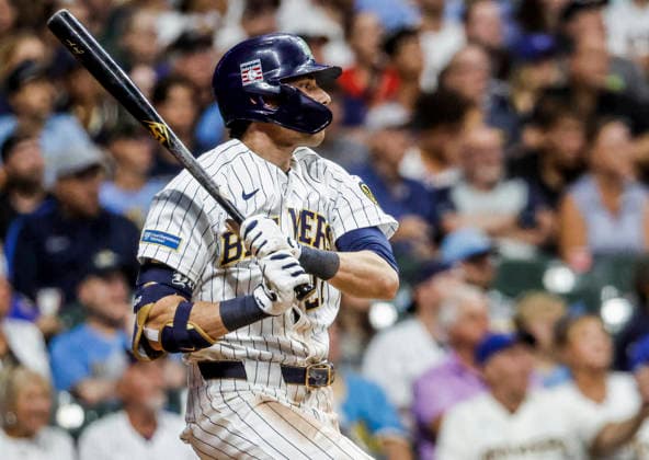 Milwaukee Brewers designated hitter Christian Yelich hits an RBI sacrifice fly ball in the eighth inning of the MLB, Baseball Herren, USA game between the Colorado Rockies and the Milwaukee Brewers at American Family Field in Milwaukee, Wisconsin on Saturday July 25, 2026. The Brewers defeated the Rockies 8-5.  MIL20260725828 TANNENxMAURY