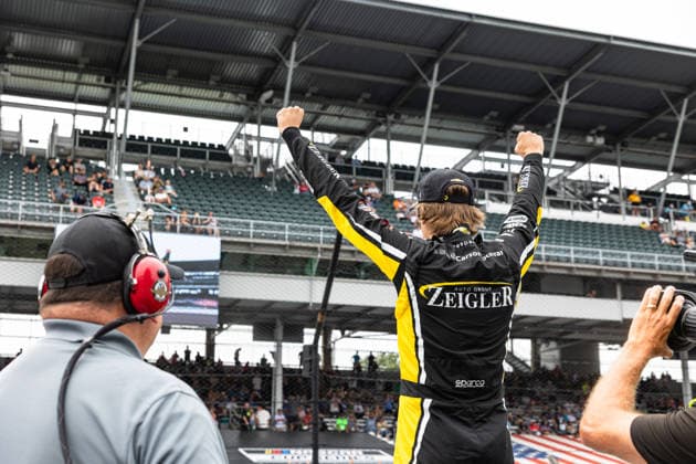 July 25, 2026, Indianapolis, Indiana, USA: CARSON HOCEVAR (77) - Spire Motorsports celebrates with the crowd after winning pole position for the 30th running of the NASCAR, Motorsport, USA Cup Series Brickyard 400. Indianapolis USA - ZUMAs355 20260725_zsp_s355_028 Copyright: xJustinxSickingx