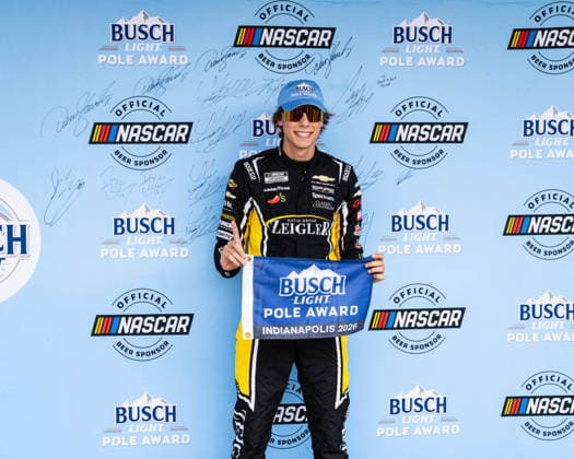 July 25, 2026, Speedway, Indianapolis, USA: CARSON HOCEVAR, driver of the No. 77 Chevrolet for Spire Motorsports (left), wins the Busch Light Pole Award for the Brickyard 400 race at the Indianapolis Motor Speedway. Speedway USA - ZUMAw173 20260725_zsp_w173_089 Copyright: xLukexWelshx