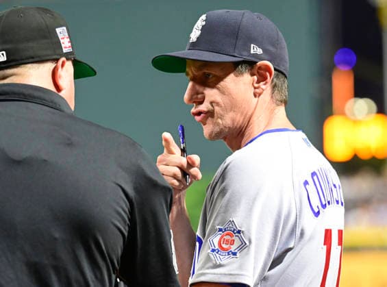Chicago Cubs manager Craig Counsell (11) reviews line up changes with home plate umpire Cory Blaser (89) between innings of the Cubs 11-0 win against the Pittsburgh Pirates in the at PNC Park on Saturday, July 25, 2026 in Pittsburgh.  PIT2026072511 ArchiexCarpenter