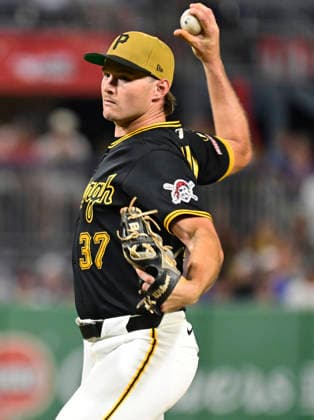 Pittsburgh Pirates left fielder Tyler Callihan (37) throws in the ninth inning the Cubs 11-0 win against the Pittsburgh Pirates in the at PNC Park on Saturday, July 25, 2026 in Pittsburgh.  PIT2026072523 ArchiexCarpenter