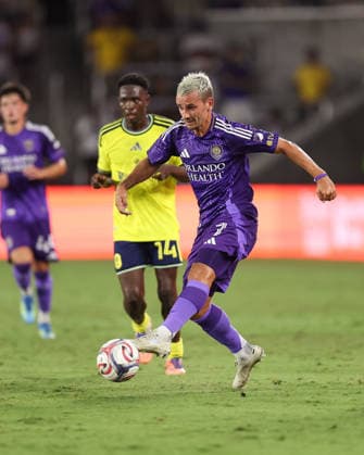 July 25, 2026, Orlando, Florida, USA: Orlando City SC forward ANTOINE GREIZMANN (7) dribbles the ball through Nashville SC defenders during a match against Nashville SC. Orlando City SC hosted Nashville SC at Inter.Co Stadium in Orlando, FL. Orlando USA - ZUMAm299 20260725_znp_m299_026 Copyright: xTaylorxMcFeex