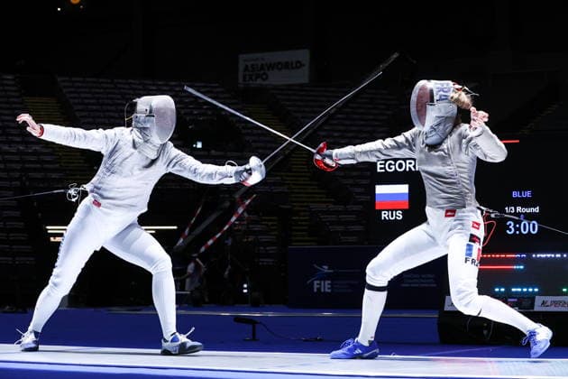 CHINA, HONG KONG - JULY 26, 2026: Russia s Yana Yegoryan (L) and France s Manon Apithy compete in the ladies individual sabre event at the 2026 Kerry Fencing World Championships. Mikhail Sinitsyn TASS  95476765