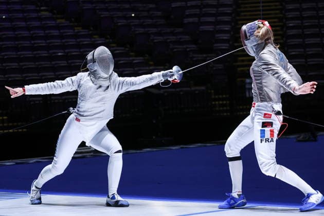 CHINA, HONG KONG - JULY 26, 2026: Russia s Yana Yegoryan (L) and France s Manon Apithy compete in the ladies individual sabre event at the 2026 Kerry Fencing World Championships. Mikhail Sinitsyn TASS  95476825