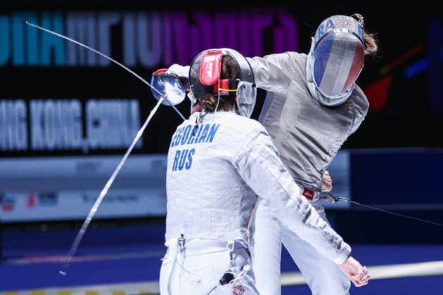 CHINA, HONG KONG - JULY 26, 2026: Russia s Yana Yegoryan (L) and France s Manon Apithy compete in the ladies individual sabre event at the 2026 Kerry Fencing World Championships. Mikhail Sinitsyn TASS  95477274
