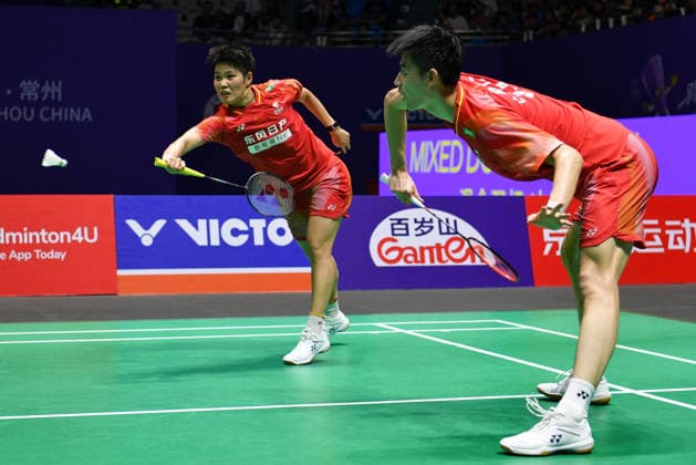 CHANGZHOU, CHINA - JULY 26: Feng Yanzhe and Huang Dongping of China compete in the Mixed Doubles Final match against Guo Xinwa and Chen Fanghui of China on day 6 of the China Open 2026 at Changzhou Olympic Sports Center Gymnasium on July 26, 2026 in Changzhou, Jiangsu Province of China.  Copyright: xVCGx 111656483099
