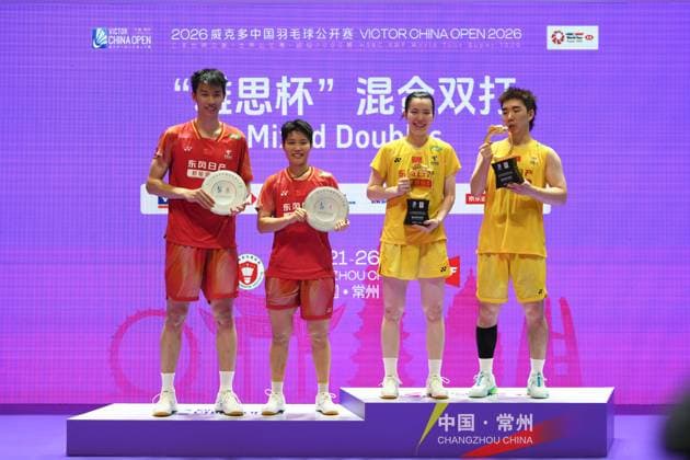 CHANGZHOU, CHINA - JULY 26: Champions Guo Xinwa and Chen Fanghui of China, runners-up Feng Yanzhe and Huang Dongping of China celebrate on the podium during the awarding ceremony after the Mixed Doubles Final match on day 6 of the China Open 2026 at Changzhou Olympic Sports Center Gymnasium on July 26, 2026 in Changzhou, Jiangsu Province of China.  Copyright: xVCGx 111656483108