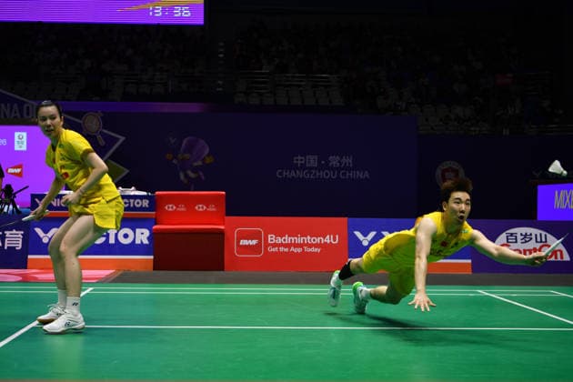 CHANGZHOU, CHINA - JULY 26: Guo Xinwa and Chen Fanghui of China compete in the Mixed Doubles Final match against Feng Yanzhe and Huang Dongping of China on day 6 of the China Open 2026 at Changzhou Olympic Sports Center Gymnasium on July 26, 2026 in Changzhou, Jiangsu Province of China.  Copyright: xVCGx 111656483086