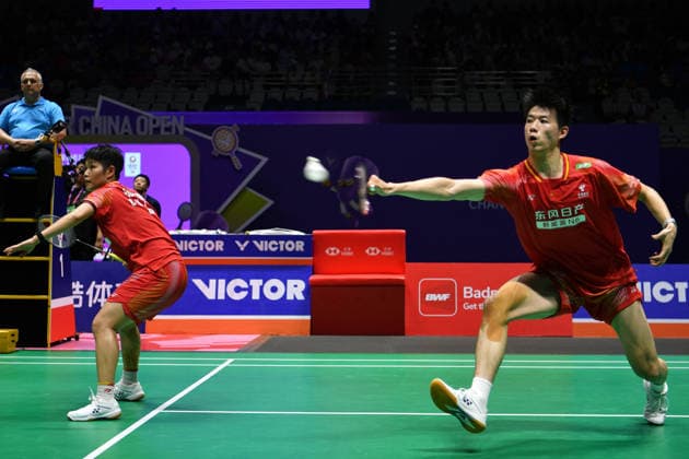 CHANGZHOU, CHINA - JULY 26: Feng Yanzhe and Huang Dongping of China compete in the Mixed Doubles Final match against Guo Xinwa and Chen Fanghui of China on day 6 of the China Open 2026 at Changzhou Olympic Sports Center Gymnasium on July 26, 2026 in Changzhou, Jiangsu Province of China.  Copyright: xVCGx 111656483092