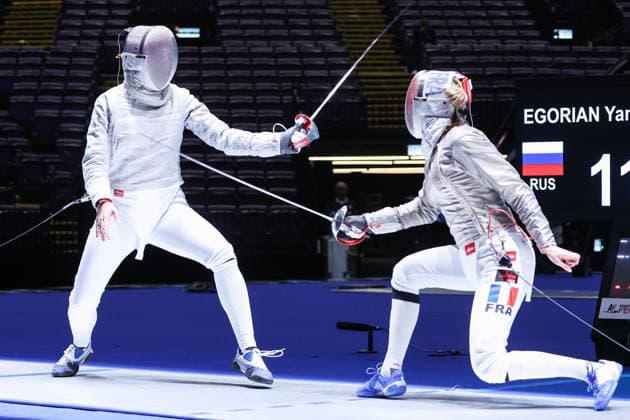 CHINA, HONG KONG - JULY 26, 2026: Russia s Yana Yegoryan (L) and France s Manon Apithy compete in the ladies individual sabre event at the 2026 Kerry Fencing World Championships 2026 Fencing World Championships In Hong Kong  - ZUMAt113 20260726_zaa_t113_015 Copyright: xMikhailxSinitsynx