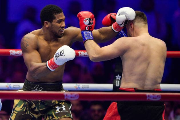 JEDDAH, SAUDI ARABIA - JULY 25: Anthony Joshua (military camouflage shorts) punches Kristian Prenga during the Heavyweight contest fight between Anthony Joshua and Kristian Prenga in the Anthony Joshua v Kristian Prenga: The Comeback fight night at Jeddah Superdome on July 25, 2026 in Jeddah, Saudi Arabia.  Copyright: xKhalidxAlhaj MBxMediax