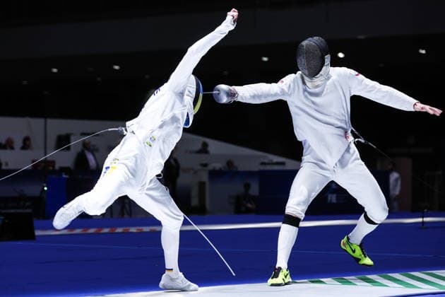 CHINA, HONG KONG - JULY 26, 2026: Ukraine s Roman Svichkar (L) and Russia s Dmitry Shvelidze compete in the men s individual epee event at the 2026 Kerry Fencing World Championships. Mikhail Sinitsyn TASS  95477425