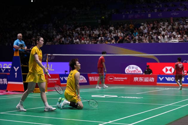 (260726) -- CHANGZHOU, July 26, 2026 -- Guo Xinwa (front R) Chen Fanghui (front L) react during the mixed doubles final match between Feng Yanzhe Huang Dongping and Guo Xinwa Chen Fanghui of China at the 2026 China Open badminton tournament in Changzhou, east China s Jiangsu Province, July 26, 2026. ) (SP)CHINA-CHANGZHOU-BADMINTON-CHINA OPEN-MIXED DOUBLES-FINAL (CN) LixBo 
