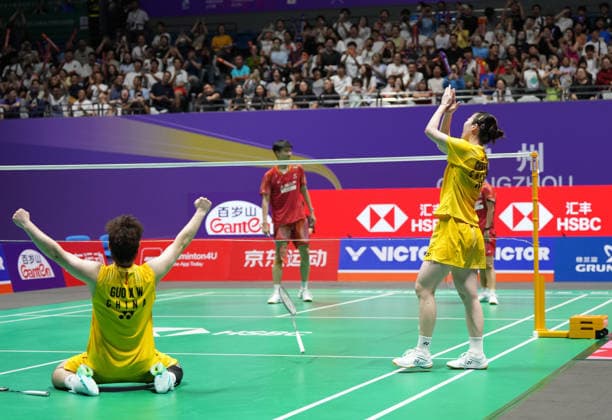 (260726) -- CHANGZHOU, July 26, 2026 -- Guo Xinwa (front L) Chen Fanghui (front R) celebrate after winning the mixed doubles final match between Feng Yanzhe Huang Dongping and Guo Xinwa Chen Fanghui of China at the 2026 China Open badminton tournament in Changzhou, east China s Jiangsu Province, July 26, 2026. ) (SP)CHINA-CHANGZHOU-BADMINTON-CHINA OPEN-MIXED DOUBLES-FINAL (CN) SunxFei 