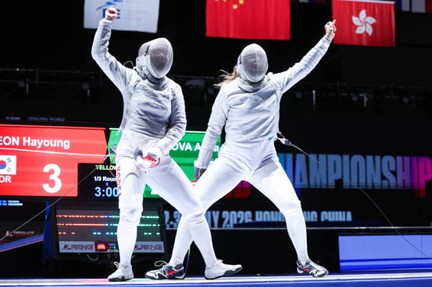 CHINA, HONG KONG - JULY 26, 2026: South Korea s Hayoung Jeon (L) and Russia s Alina Mikhailova compete in the ladies individual sabre event at the 2026 Kerry Fencing World Championships. Mikhail Sinitsyn TASS  95478338