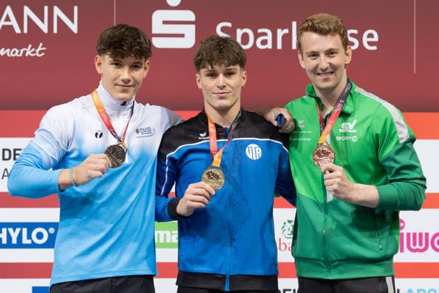 Deutsche Meisterschaften im Gerätturnen 2026, Gerätfinals Siegerehrung im Gerätfinale der Männer, Sprung. Von links: Maxim Kovalenko (TV 1883 Bous), Marcel Graf (VT Rinteln) und Nils Dunkel (SV Halle). Deutsche Meisterschaften im Gerätturnen, Gerätfinals, am 26. Juli 2026 in der ZAG-Arena in Hannover., Hannover Niedersachsen Deutschland ZAG Arena *** 2026 German Artistic Gymnastics Championships, Apparatus Finals; Medal Ceremony for the Men’s Apparatus Finals, Vault. From left: Maxim Kovalenko (TV 1883 Bous), Marcel Graf (VT Rinteln), and Nils Dunkel (SV Halle). German Artistic Gymnastics Championships, Apparatus Finals, on July 26, 2026, at the ZAG Arena in Hanover, Hanover, Lower Saxony, Germany. ZAG Arena