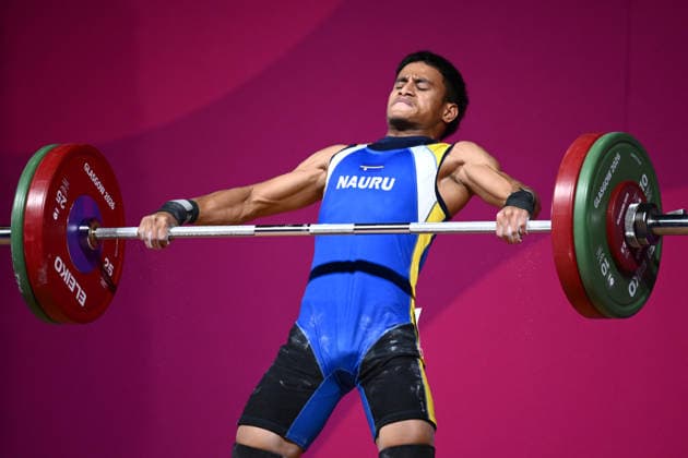 COM26 WEIGHTLIFTING, Johannes Adam of Nauru competes during the Men s 62kg Weightlifting of the Glasgow 2026 Commonwealth Games at the SEC Armadillo in Glasgow, Scotland, Sunday, July 26, 2026. ( NO ARCHIVING, EDITORIAL USE ONLY Glasgow United Kingdom  Copyright: xJOELxCARRETTx 20260726166378679293