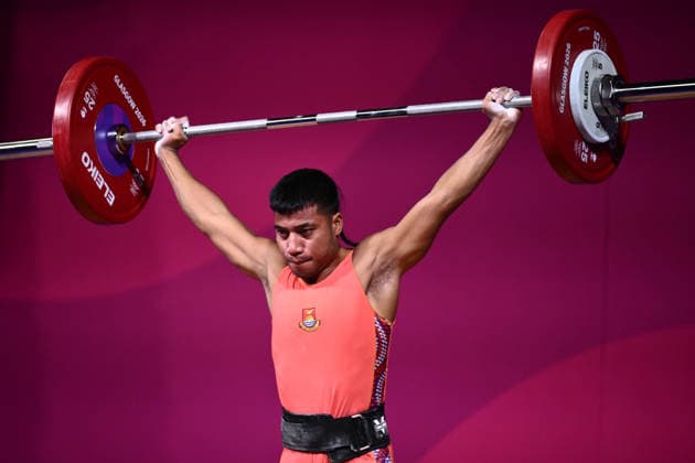 COM26 WEIGHTLIFTING, Reinataake Takenteiti of Kiribati competes during the Men s 62kg Weightlifting of the Glasgow 2026 Commonwealth Games at the SEC Armadillo in Glasgow, Scotland, Sunday, July 26, 2026. ( NO ARCHIVING, EDITORIAL USE ONLY Glasgow United Kingdom  Copyright: xJOELxCARRETTx 20260726123788780218