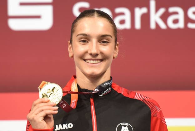26.07.2026, xhbx, Turnen DM Finals 2026, Gerätfinals Frauen v.l. Helen Kevric (MTV Stuttgart 1843) Siegerehrung Gold (DFL DFB REGULATIONS PROHIBIT ANY USE OF PHOTOGRAPHS as IMAGE SEQUENCES and or QUASI-VIDEO) Hannover *** July 26, 2026, xhbx, 2026 German Gymnastics Championships Finals, Women’s Apparatus Finals, Helen Kevric, MTV Stuttgart 1843, Gold Medal Ceremony. DFL and DFB regulations prohibit any use of photographs as image sequences and or quasi-video. Hanover