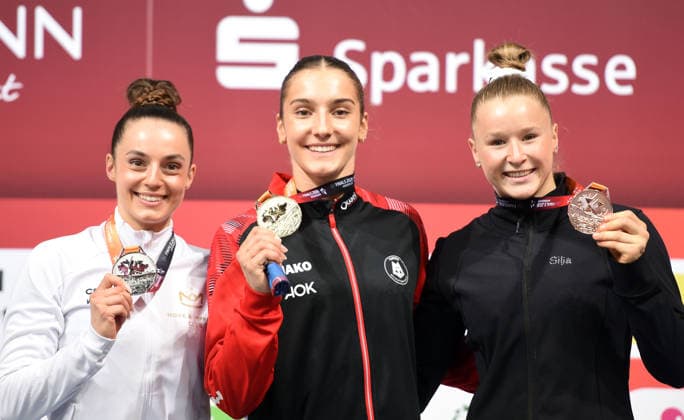 26.07.2026, xhbx, Turnen DM Finals 2026, Gerätfinals Frauen v.l. Pauline Schäfer-Betz (KTV Chemnitz), Helen Kevric (MTV Stuttgart 1843), Silja Stöhr (SG Heddesheim) Siegerehrung (DFL DFB REGULATIONS PROHIBIT ANY USE OF PHOTOGRAPHS as IMAGE SEQUENCES and or QUASI-VIDEO) Hannover *** July 26, 2026, xhbx, 2026 German Gymnastics Championships Finals, Women’s Apparatus Finals (from left): Pauline Schäfer Betz, KTV Chemnitz, Helen Kevric, MTV Stuttgart 1843, Silja Stöhr, SG Heddesheim, Award Ceremony. DFL and DFB regulations prohibit any use of photographs as image sequences and or quasi-video. Hanover